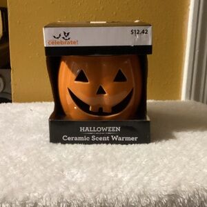 Celebrate! brand  Halloween Pumpkin Scent Warmer - Orange